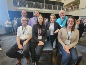 kinefac team with gov healey after receiving award